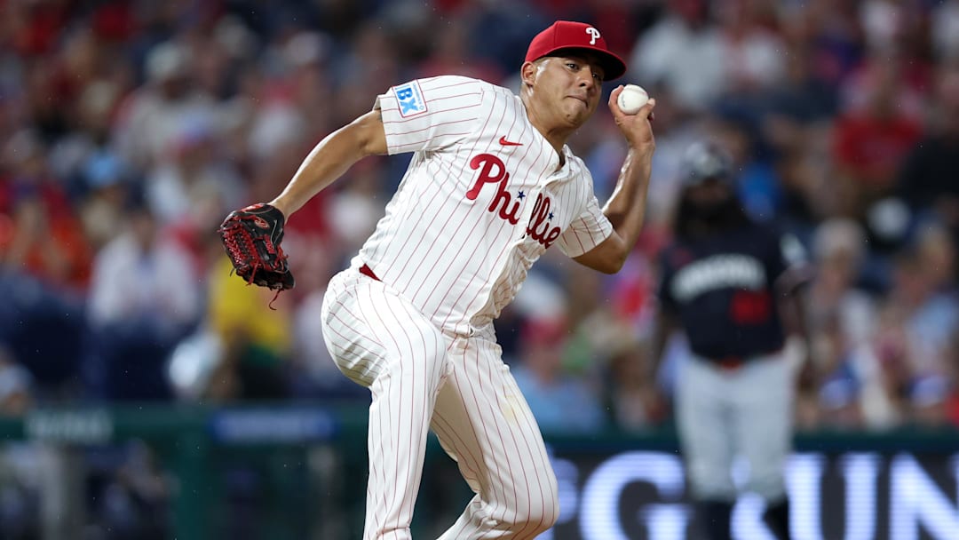 Sep 27, 2025; Philadelphia, Pennsylvania, USA; Philadelphia Phillies pitcher Ranger Suarez (55) attempts to make a play at first after being hit with a line drive during the fifth inning against the Minnesota Twins at Citizens Bank Park. Mandatory Credit: Bill Streicher-Imagn Images