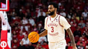 Mar 9, 2025; Lincoln, Nebraska, USA; Nebraska Cornhuskers guard Brice Williams (3) dribbles against the Iowa Hawkeyes during the first half at Pinnacle Bank Arena. 