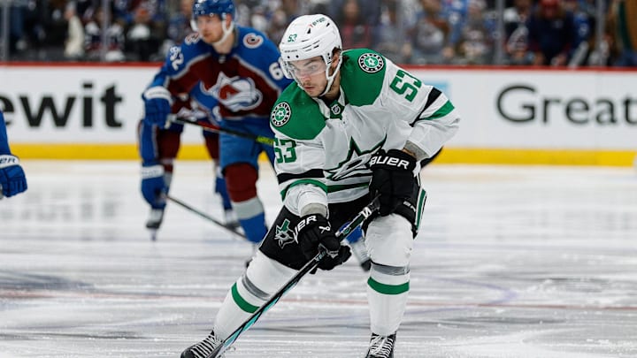 May 13, 2024; Denver, Colorado, USA; Dallas Stars center Wyatt Johnston (53) controls the puck in the third period against the Colorado Avalanche in game four of the second round of the 2024 Stanley Cup Playoffs at Ball Arena. Mandatory Credit: Isaiah J. Downing-Imagn Images