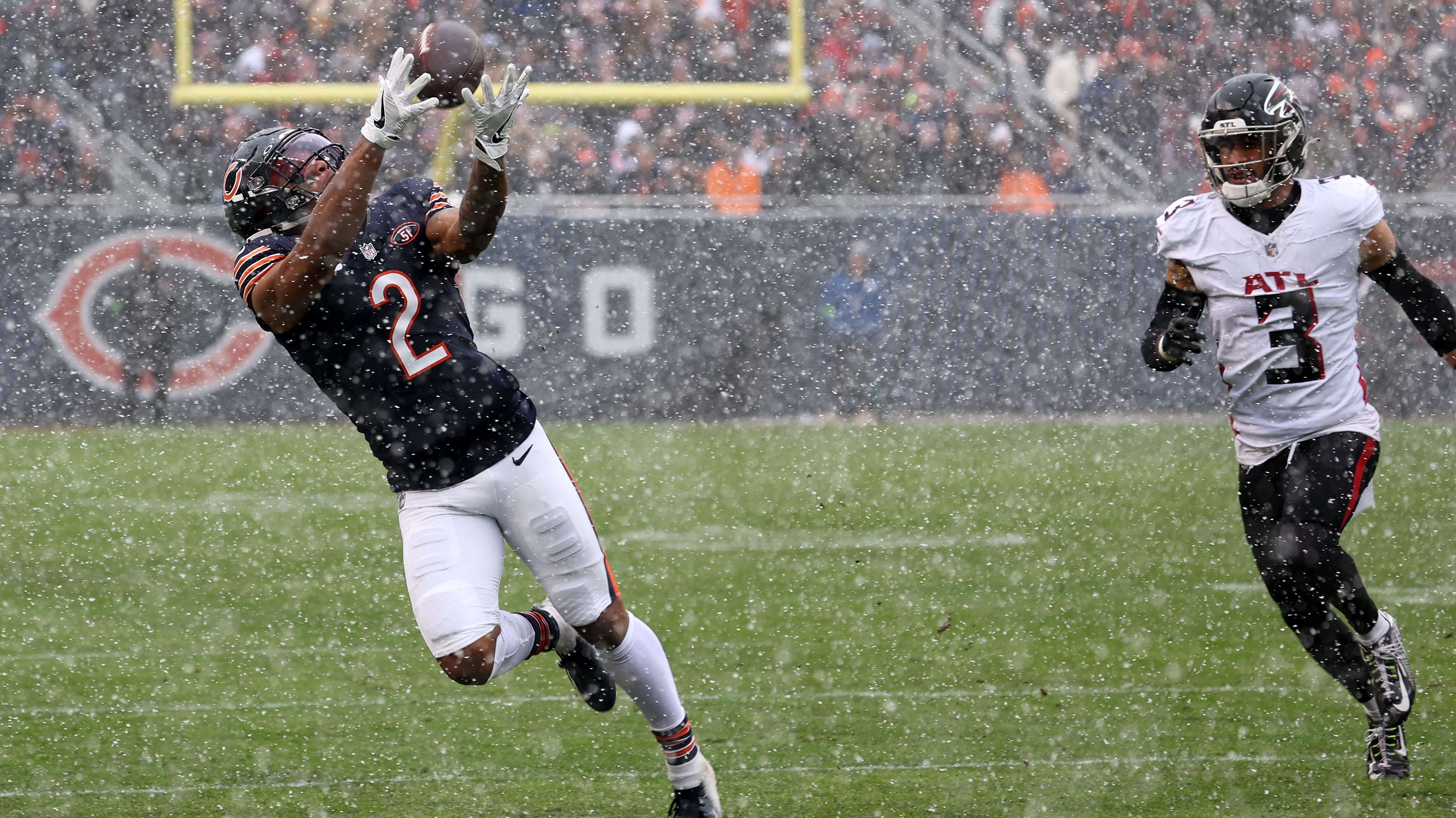 DJ Moore hauls in the ball near the sidelines against Atlanta last season.