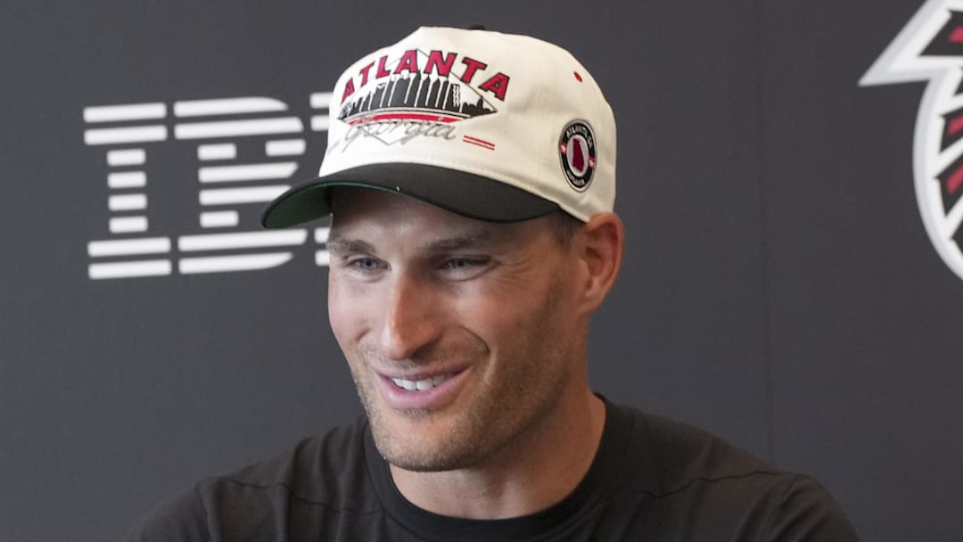 Former Atlanta Falcons quarterback Kirk Cousins talks to the media.