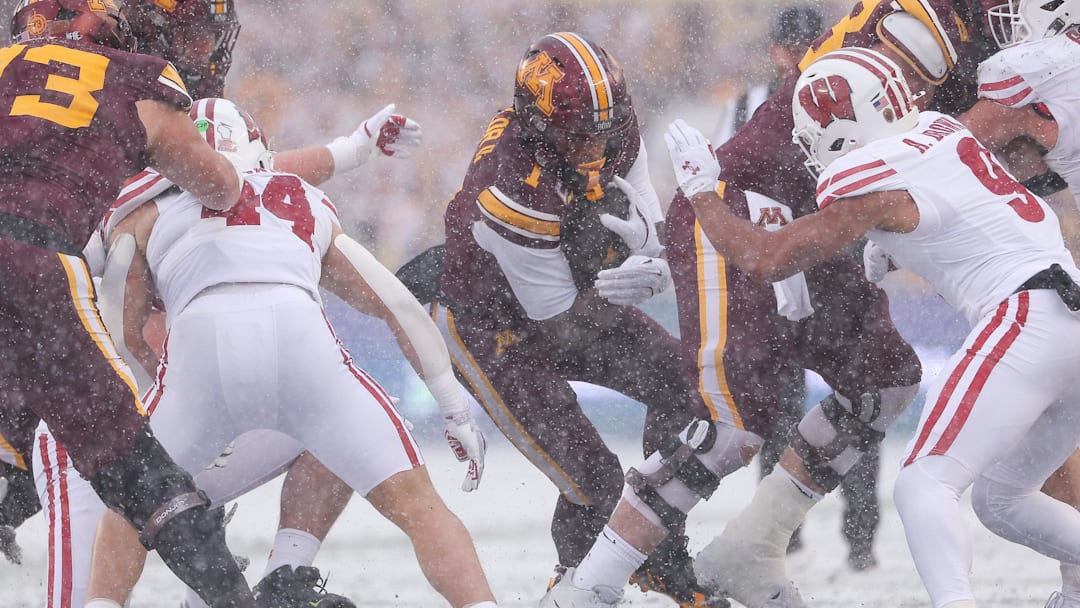 Nov 29, 2025; Minneapolis, Minnesota, USA; Minnesota Golden Gophers running back Darius Taylor (1) runs the ball against the Wisconsin Badgers during the first half at Huntington Bank Stadium. Mandatory Credit: Matt Krohn-Imagn Images