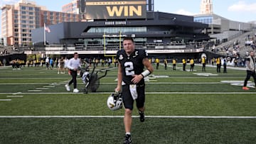 Sep 27, 2025; Nashville, Tennessee, USA;  Vanderbilt Commodores quarterback Diego Pavia (2) runs off the field after the win against the Utah State Aggies after the game at FirstBank Stadium. Mandatory Credit: Steve Roberts-Imagn Images