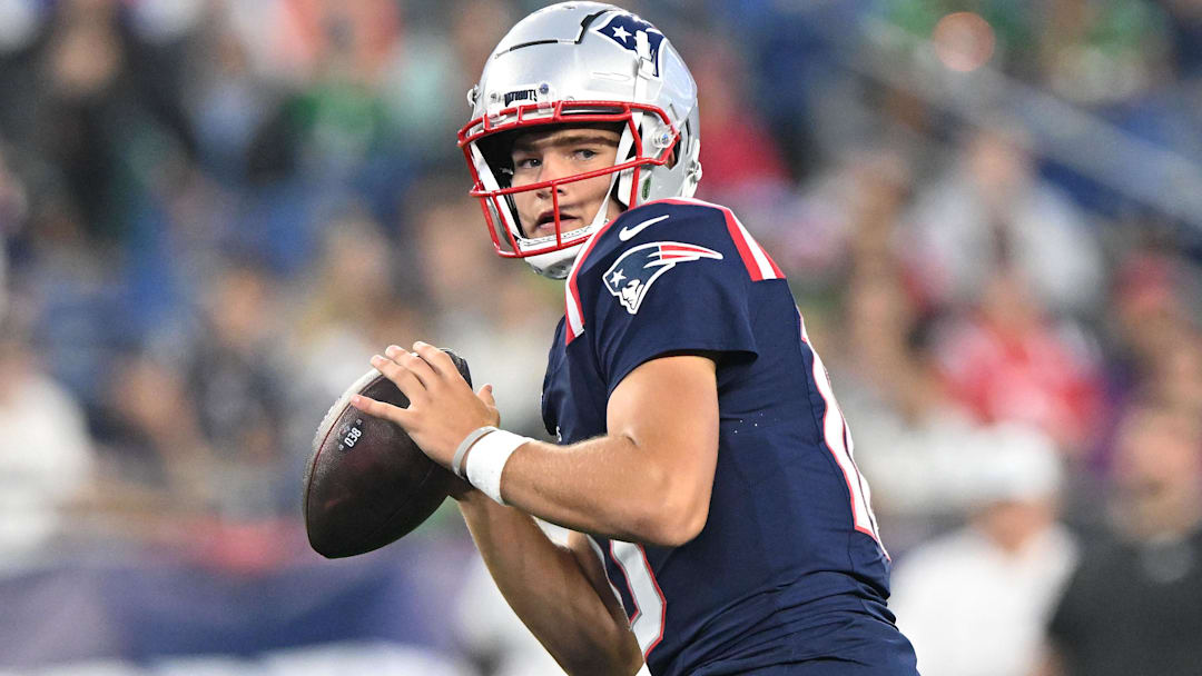 Aug 15, 2024; Foxborough, Massachusetts, USA; New England Patriots quarterback Drake Maye (10) looks to throw against the Philadelphia Eagles during the first half at Gillette Stadium. Mandatory Credit: Brian Fluharty-Imagn Images