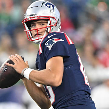 Aug 15, 2024; Foxborough, Massachusetts, USA; New England Patriots quarterback Drake Maye (10) looks to throw against the Philadelphia Eagles during the first half at Gillette Stadium. Mandatory Credit: Brian Fluharty-Imagn Images