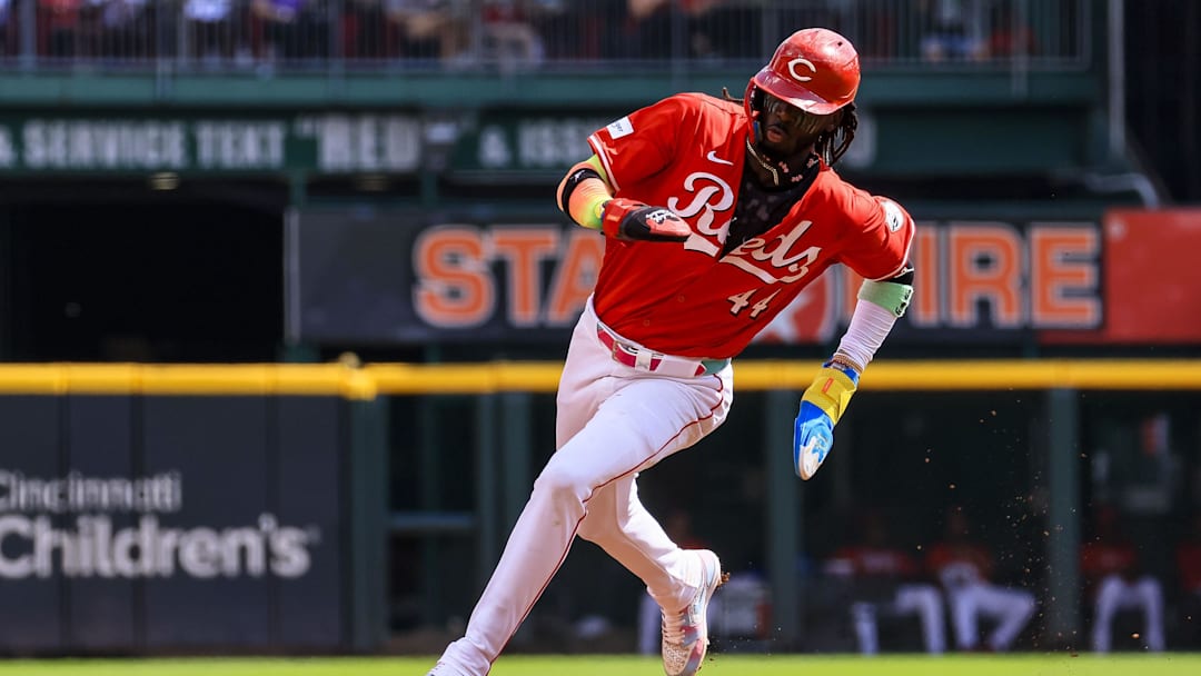 Sep 21, 2024; Cincinnati, Ohio, USA; Cincinnati Reds shortstop Elly De La Cruz (44) scores on a single hit by catcher Tyler Stephenson (not pictured) in the third inning against the Pittsburgh Pirates at Great American Ball Park. Mandatory Credit: Katie Stratman-Imagn Images
