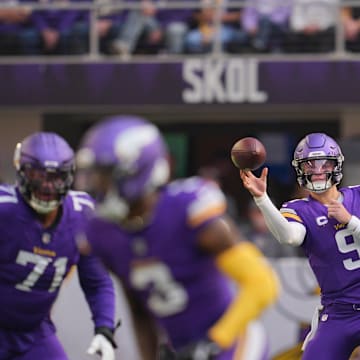 Nov 16, 2025; Minneapolis, Minnesota, USA;  Minnesota Vikings quarterback J.J. McCarthy (9) throws downfield during the first quarter against the Chicago Bears at U.S. Bank Stadium. Mandatory Credit: Brad Rempel-Imagn Images