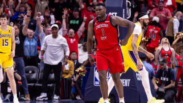 Apr 16, 2024; New Orleans, Louisiana, USA; New Orleans Pelicans forward Zion Williamson (1) reacts to making a basket against Los Angeles Lakers forward Anthony Davis (3) during the second half of a play-in game of the 2024 NBA playoffs at Smoothie King Center. 