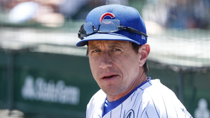 Jun 2, 2024; Chicago, Illinois, USA; Chicago Cubs manager Craig Counsell (30) looks on from the dugout before a baseball game against the Cincinnati Reds at Wrigley Field. 