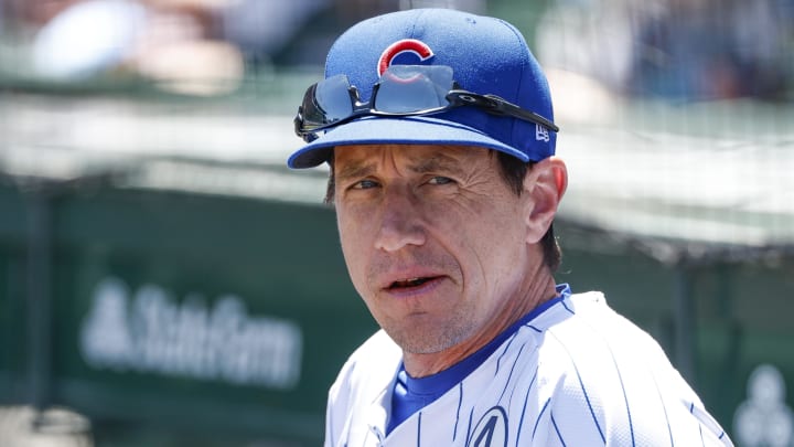 Jun 2, 2024; Chicago, Illinois, USA; Chicago Cubs manager Craig Counsell (30) looks on from the dugout before a baseball game against the Cincinnati Reds at Wrigley Field.