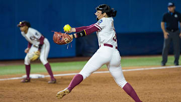 Jun 7, 2023; Oklahoma City, OK, USA;  Florida State Seminoles pitcher Allison Royalty (5) throws a pitch in the sixth inning against the Oklahoma Sooners during game one of the Women's College World Series finals at OGE Energy Field at the USA Softball Hall of Fame Complex. Oklahoma won 5-0. Mandatory Credit: Brett Rojo-USA TODAY Sports