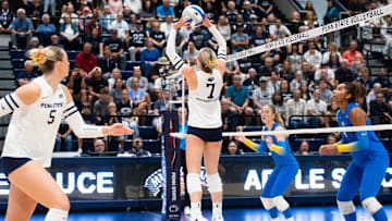 Penn State's Addie Lyon (7) sets the ball during a Big Ten volleyball match against UCLA on Sunday, Sept. 28, 2025, in State College.