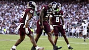 Texas A&M Aggies defensive end Cashius Howell (9) reacts after sacking Auburn Tigers quarterback Jackson Arnold during the fourth quarter at Kyle Field. Mandatory Credit: Maria Lysaker-Imagn Images 
