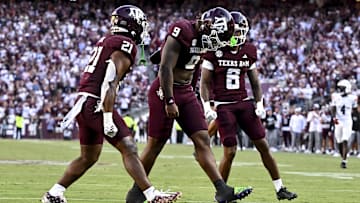 Texas A&M Aggies defensive end Cashius Howell (9) reacts after sacking Auburn Tigers quarterback Jackson Arnold during the fourth quarter at Kyle Field. Mandatory Credit: Maria Lysaker-Imagn Images 