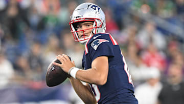 Aug 15, 2024; Foxborough, Massachusetts, USA; New England Patriots quarterback Drake Maye (10) looks to throw against the Philadelphia Eagles during the first half at Gillette Stadium. Mandatory Credit: Brian Fluharty-Imagn Images