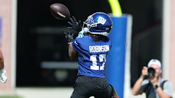 Jul 23, 2025; East Rutherford, NJ, USA; New York Giants wide receiver Wan'Dale Robinson (17) catches the ball during training camp at Quest Diagnostics Training Center. Mandatory Credit: Vincent Carchietta-Imagn Images