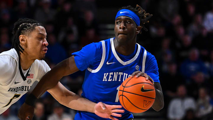 Jan 27, 2026; Nashville, Tennessee, USA;  Vanderbilt Commodores guard Chandler Bing (7) guards Kentucky Wildcats guard Denzel Aberdeen (1) during the first half at Memorial Gymnasium. Mandatory Credit: Steve Roberts-Imagn Images