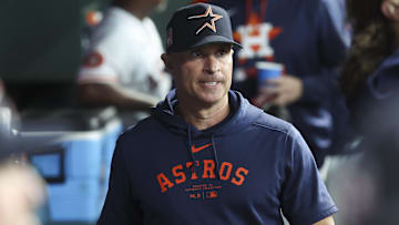 Jul 26, 2025; Houston, Texas, USA; Houston Astros manager Joe Espada (19) walks in the dugout before the game against the Athletics at Daikin Park. Mandatory Credit: Troy Taormina-Imagn Images