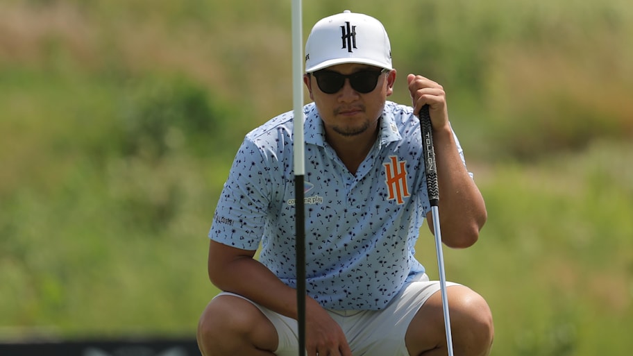 Jinichiro Kozuma of Iron Heads GC lines up his shot on the on 13th hole during the first round of 2025 LIV Golf Chicago