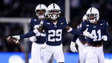 Nov 30, 2024; University Park, Pennsylvania, USA; Penn State Nittany Lions cornerback Audavion Collins (29) celebrates after intercepting the ball against the Maryland Terrapins during the second quarter at Beaver Stadium. Mandatory Credit: Matthew O'Haren-Imagn Images