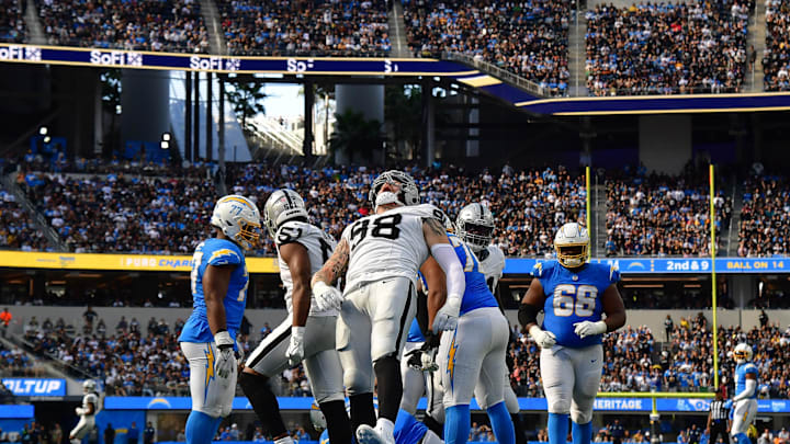 Oct 1, 2023; Inglewood, California, USA; Las Vegas Raiders defensive end Maxx Crosby (98) celebrates after sacking Los Angeles Chargers quarterback Justin Herbert (10) during the second half at SoFi Stadium. Mandatory Credit: Gary A. Vasquez-Imagn Images