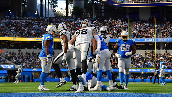 Oct 1, 2023; Inglewood, California, USA; Las Vegas Raiders defensive end Maxx Crosby (98) celebrates after sacking Los Angeles Chargers quarterback Justin Herbert (10) during the second half at SoFi Stadium. Mandatory Credit: Gary A. Vasquez-Imagn Images