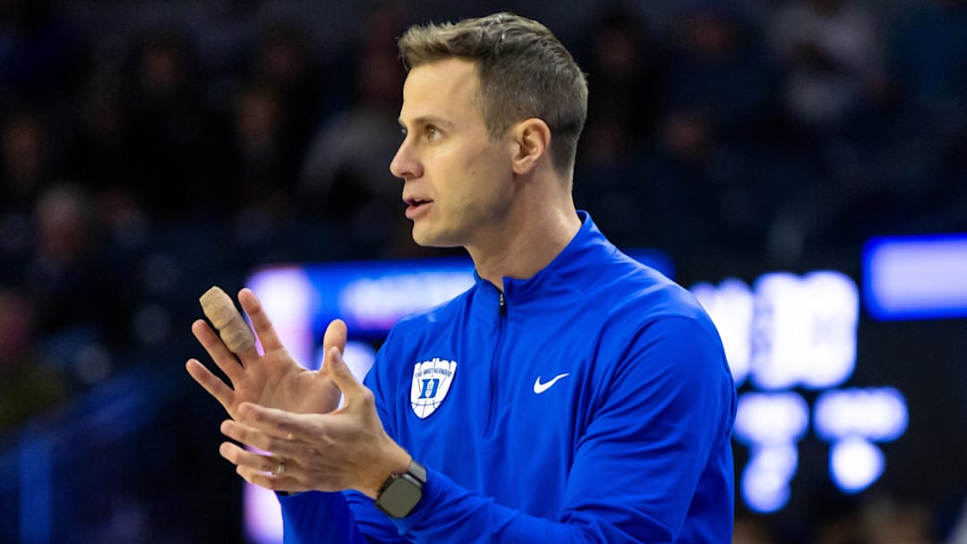 Feb 24, 2026; South Bend, Indiana, USA; Duke Blue Devils head coach Jon Scheyer claps against the Notre Dame Fighting Irish during the second half at Purcell Pavilion at the Joyce Center. Mandatory Credit: Michael Caterina-Imagn Images