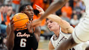 Oklahoma State's Brandon Newman gets a loose ball from Southern Illinois' Jarrett Hensley 
