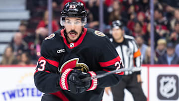 Mar 20, 2025; Ottawa, Ontario, CAN; Ottawa Senators defenseman Travis Hamonic (23) follows the puck in the second period against the Colorado Avalanche at the Canadian Tire Centre. Mandatory Credit: Marc DesRosiers-Imagn Images