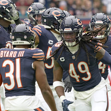 Tremaine Edmunds celebrates a turnover last season with defensive teammates. Will he stay at middle linebacker?