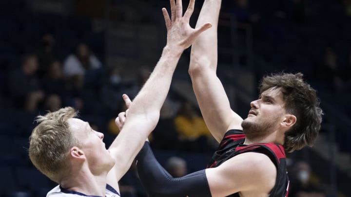 December 7, 2022; Berkeley, California, USA; Eastern Washington Eagles forward Ethan Price (10) shoots the basketball against California Golden Bears forward Lars Thiemann (21) during the second half at Haas Pavilion. Mandatory Credit: Kyle Terada-USA TODAY Sports