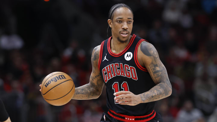 Mar 25, 2024; Chicago, Illinois, USA; Chicago Bulls forward DeMar DeRozan (11) brings the ball up court against the Washington Wizards during the first half at United Center. Mandatory Credit: Kamil Krzaczynski-USA TODAY Sports