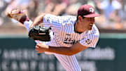 Texas A&M pitcher Ryan Prager (18) delivers a pitch during the first inning against the Oregon at Olsen Field, Blue Bell Park 