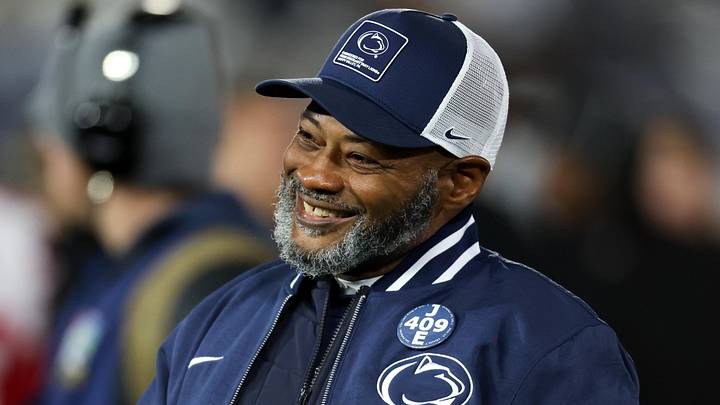 Nov 22, 2025; University Park, Pennsylvania, USA; Penn State Nittany Lions interim head coach Terry Smith walks on the field during a warm up prior to the game against the Nebraska Cornhuskers at Beaver Stadium. Mandatory Credit: Matthew O'Haren-Imagn Images