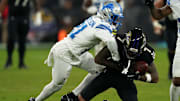 Sep 22, 2025; Baltimore, Maryland, USA; Baltimore Ravens wide receiver Rashod Bateman (7) makes a catch against Detroit Lions cornerback Amik Robertson (21) during the second half at M&T Bank Stadium. Mandatory Credit: Mitch Stringer-Imagn Images
