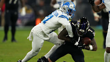 Sep 22, 2025; Baltimore, Maryland, USA; Baltimore Ravens wide receiver Rashod Bateman (7) makes a catch against Detroit Lions cornerback Amik Robertson (21) during the second half at M&T Bank Stadium. Mandatory Credit: Mitch Stringer-Imagn Images
