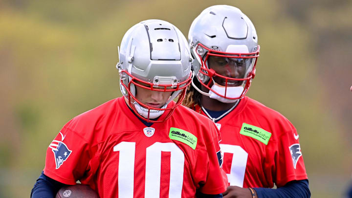 May 11, 2024; Foxborough, MA, USA; New England Patriots quarterback Drake Maye (10) (front) and New England Patriots quarterback Joe Milton III (19)(back) work out at the New England Patriots rookie camp at Gillette Stadium.  Mandatory Credit: Eric Canha-Imagn Images