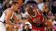 Suns guard Dan Majerle defends Bulls guard Michael Jordan during Game 1 of the NBA Finals in 1993 in Phoenix.