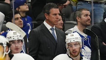Dec 16, 2023; Toronto, Ontario, CAN; Pittsburgh Penguins head coach Mike Sullivan (middle) looks on from the bench during the second period against the Toronto Maple Leafs at Scotiabank Arena. Mandatory Credit: John E. Sokolowski-Imagn Images