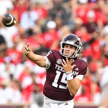 Sep 2, 2023; College Station, Texas, USA; Texas A&M Aggies quarterback Conner Weigman (15) throws a pass during the first quarter against the New Mexico Lobos at Kyle Field. Mandatory Credit: Maria Lysaker-USA TODAY Sports