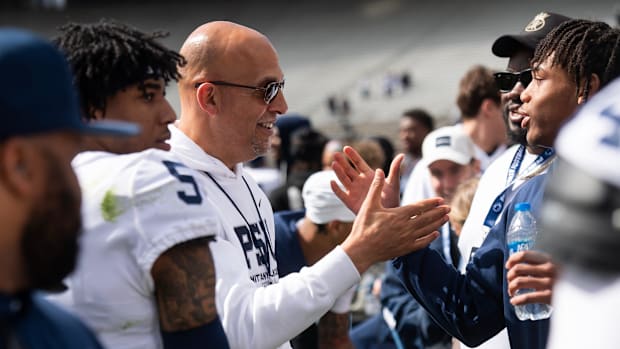 Penn State football head coach James Franklin greets recruits and their families following the Blue-White game 