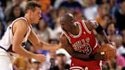 Suns guard Dan Majerle defends Bulls guard Michael Jordan 