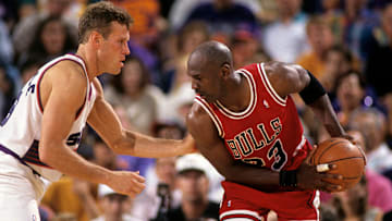 Suns guard Dan Majerle defends Bulls guard Michael Jordan 
