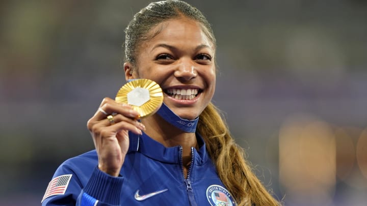 Gabrielle Thomas (USA) celebrates her gold medal in the women's 200m during the Paris 2024 Olympic Summer Games.