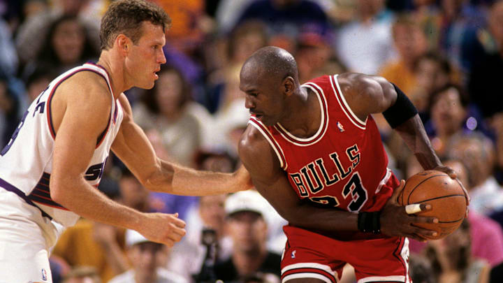 Suns guard Dan Majerle defends Bulls guard Michael Jordan during Game 1 of the NBA Finals in 1993