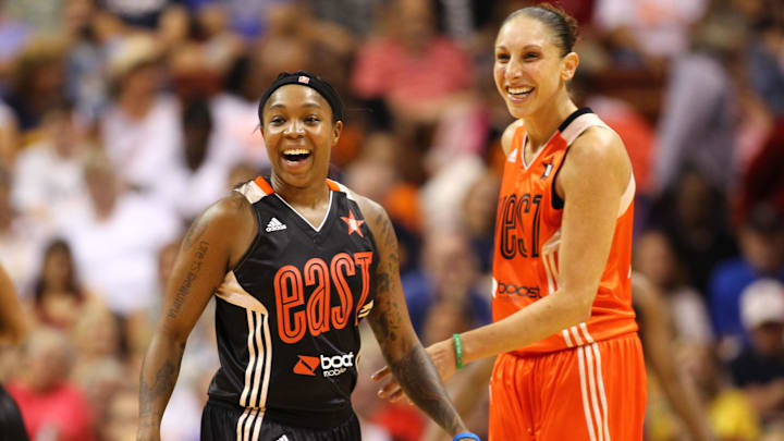 Jul 27, 2013; Uncasville, CT, USA; Eastern Conference guard Cappie Pondexter (23) of the New York Liberty and Western Conference guard Diana Taurasi (03) of the Phoenix Mercury smile during the 2013 WNBA All Star Game at Mohegan Sun Arena. Mandatory Credit: Danny Wild-Imagn Images