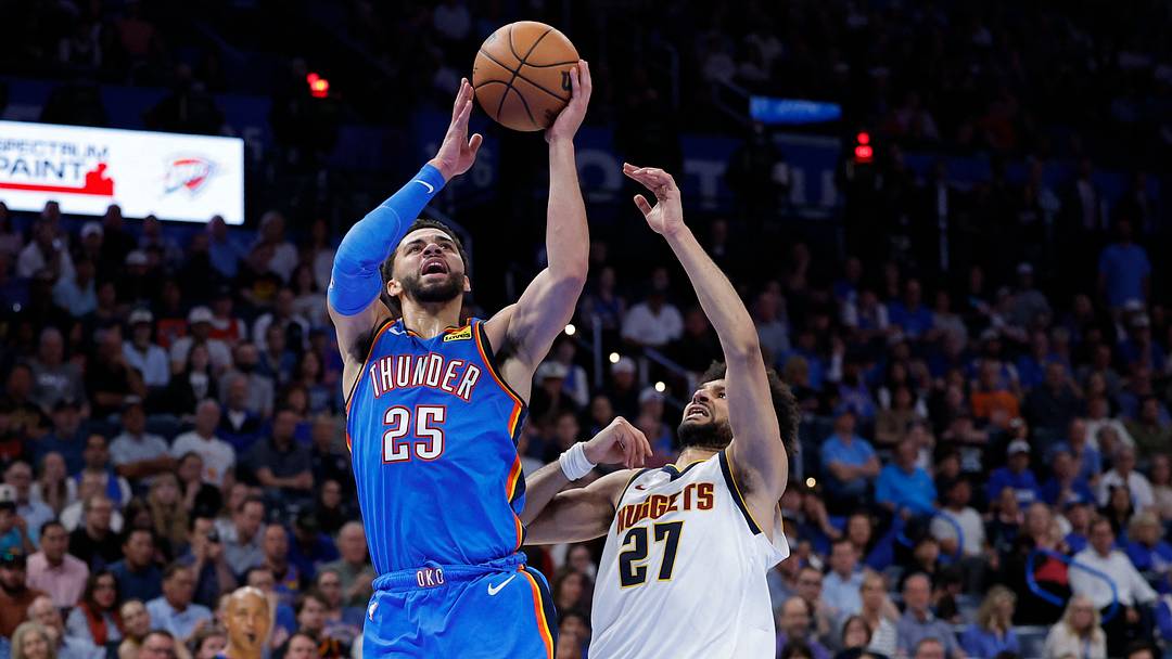 Mar 9, 2026; Oklahoma City, Oklahoma, USA; Oklahoma City Thunder guard Ajay Mitchell (25) goes up for a basket beside Denver Nuggets guard Jamal Murray (27) during the second half at Paycom Center. Mandatory Credit: Alonzo Adams-Imagn Images Mar 9, 2026; Oklahoma City, Oklahoma, USA; Oklahoma City Thunder guard Ajay Mitchell (25) goes up for a basket beside Denver Nuggets guard Jamal Murray (27) during the second half at Paycom Center. Mandatory Credit: Alonzo Adams-Imagn Images