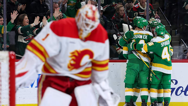 Nov 9, 2025; Saint Paul, Minnesota, USA; Minnesota Wild left wing Matt Boldy (12) celebrates his goal with teammates during the second period against the Calgary Flames at Grand Casino Arena. Mandatory Credit: Matt Krohn-Imagn Images
