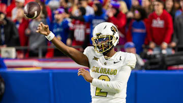 Nov 23, 2024; Kansas City, Missouri, USA;  Colorado quarterback Shedeur Sanders (2) warms up during the 4th quarter between the Kansas Jayhawks and the Colorado Buffaloes at GEHA Field at Arrowhead Stadium. Mandatory Credit: Nick Tre. Smith-Imagn Images