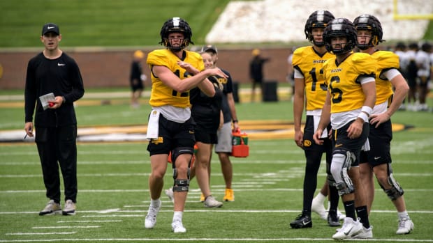 Missouri Tigers quarterback Brady Cook throws a ball at practice at Faurot Field in Columbia, Mo. on Tuesday, August 13, 2024